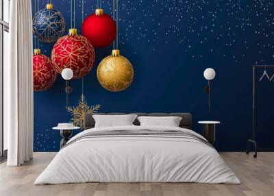 Festive red and gold Christmas ornaments hanging against a dark blue background with falling snowflakes. Ideal for holiday cards and festive designs. Wall mural