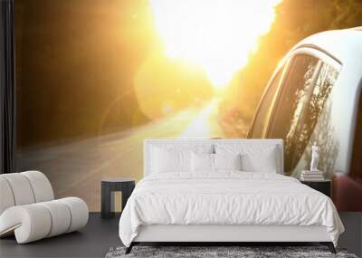 car on the road with sunset Wall mural