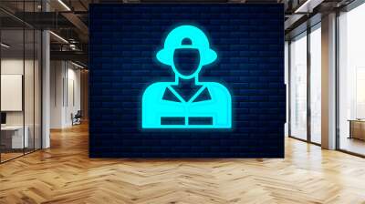 Glowing neon Firefighter icon isolated on brick wall background. Vector. Wall mural