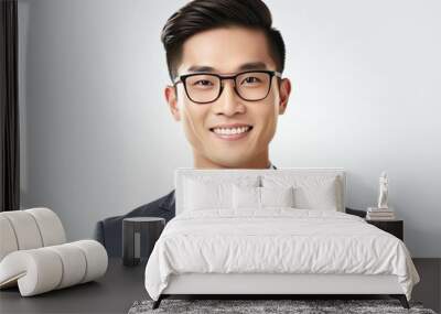 Asian man, company worker in glasses, smiling, standing over white background Wall mural