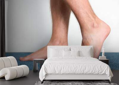 healthy male feet feeling comfortable at home. Wall mural