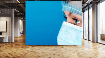 Professional doctor at work blue background Wall mural