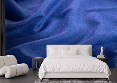 Fine blue cashmere texture. Fashion concept. Textile background close-up. Wall mural