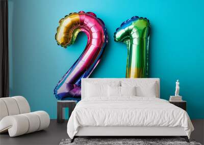 
Rainbow foil balloon number twenty one. Top view. Colored number on blue background. Wall mural