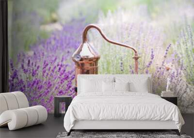 Distillation of lavender essential oil and hydrolate. Copper alambic for the flowering field. Wall mural