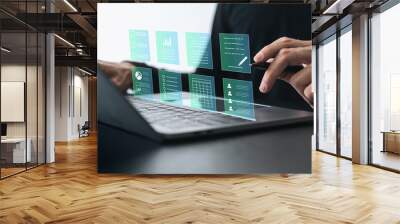 Businessman working on tablet with business and financial paperless report file, contract, plan, data and information. .Online e-document management and paperless workflow or office concept Wall mural