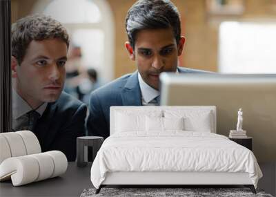 Businessmen working at computer in conference room Wall mural