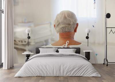 Patient siting in hospital room Wall mural