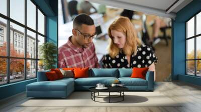 People reading folders in office Wall mural