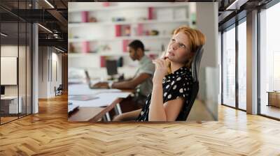 Portrait of woman in office Wall mural