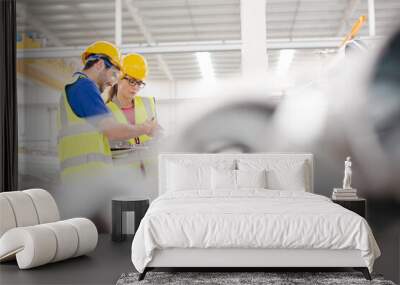 Workers with digital tablet working in factory Wall mural