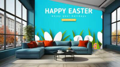 Easter card with white bunny rabbits, colorful eggs and green grass. Blue sky background with sun and clouds in paper cut style. Vector illustration. Place for your text. Wall mural