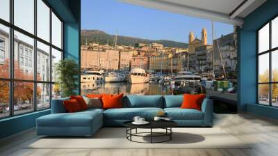 View of St Jean Baptiste cathedral and old port of Bastia ,second largest corsican city and main entry point to the island Wall mural