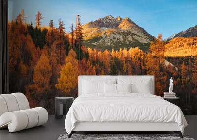 Autumn in the High Tatras is a sight to behold, with the Gerlach peak rising above a sea of changing leaves Wall mural