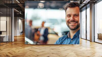 A man is smiling in front of a car Wall mural