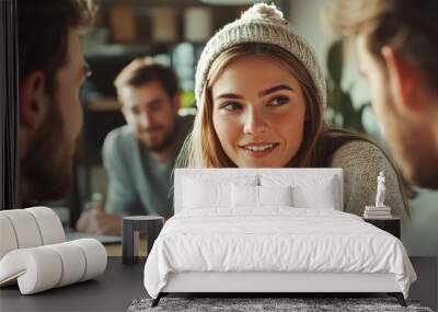 A woman wearing a white hat is smiling at two men Wall mural