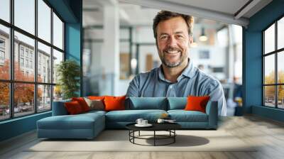 Confident Male Entrepreneur Smiling in Office Portrait Wall mural