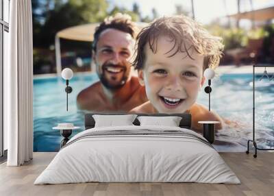 Happy father with young son swim in a pool of warm clear water on vacation. Satisfied child learns to swim with his mother in the pool, close-up Wall mural