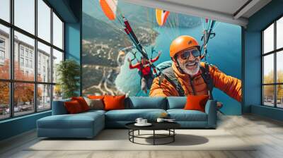 middle-aged paragliders as they soar above scenic landscapes, focusing on their joyful expressions. Wall mural