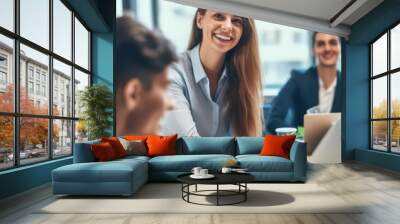 Portrait of a group of young business people having a meeting in the office. Teamwork and success concept, portrait of a smart young businesswoman Wall mural