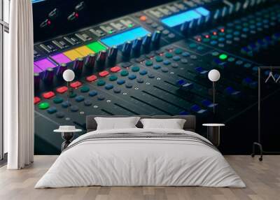 Board mixing console. Mixer. The sound engineer's console. Sound engineer's fingers are pressing the button audio controller.work place sound engineer's. Wall mural