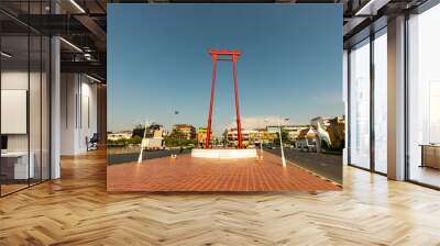 Bangkok, Thailand - MARCH 17,2022 : Sao Ching Cha (Giant Swing) with Wat Suthat temple and old style building in Bangkok old town. Wall mural