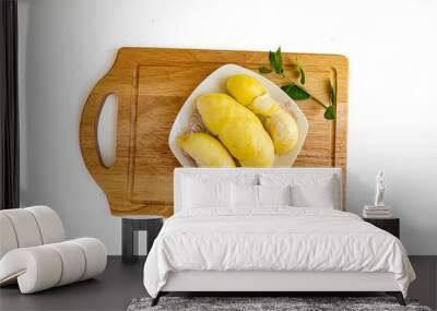 Fresh durian fruit placed on a white plate. Durian the king of fruits in Thailand Wall mural