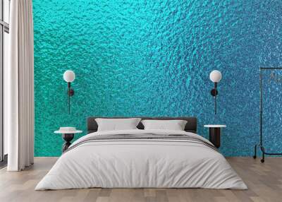 Teal green blue foil paper texture background. Wall mural