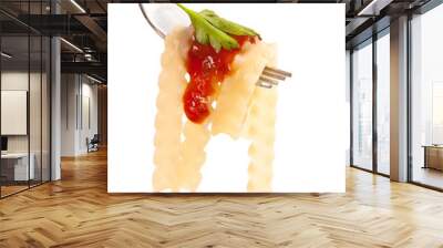 Fresh spaghetti with red tomato sauce on fork close up Wall mural