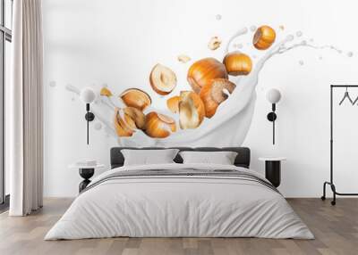 Crushed hazelnuts in milk splash close-up on white background Wall mural