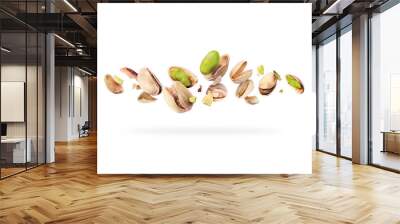 Crushed pistachios close-up hovered in white space Wall mural