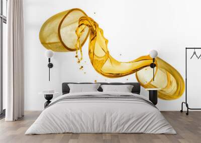 Fish oil capsule cut into two halves with splashes of fat close up Wall mural