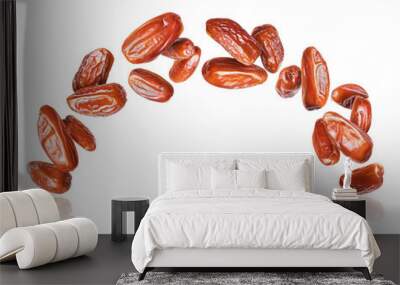 Tasty dried dates in the air isolated on a white background Wall mural