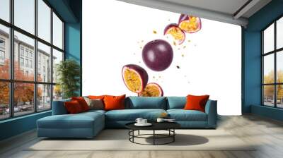 Whole and sliced fresh passion fruit (passiflora) in the air on a white background Wall mural