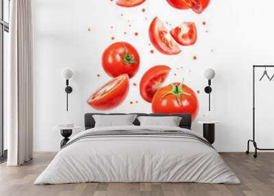 Whole and sliced fresh tomatoes in the air on a white background Wall mural