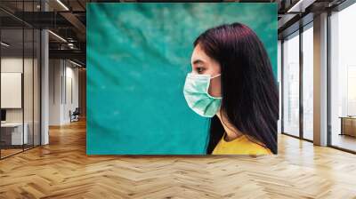 Asian women wear masks to protect against viruses Wall mural