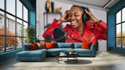 African american woman musician singing song at music studio Wall mural