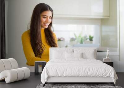 beauitul young woman working using computer laptop concentrated and smiling Wall mural