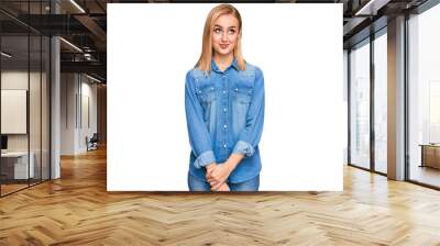 Beautiful caucasian woman wearing casual denim jacket smiling looking to the side and staring away thinking. Wall mural