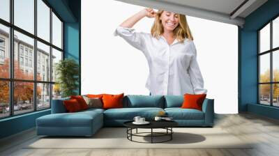 Beautiful young business woman over isolated background Dancing happy and cheerful, smiling moving casual and confident listening to music Wall mural