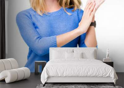 Beautiful young woman wearing blue sweater over isolated background Clapping and applauding happy and joyful, smiling proud hands together Wall mural