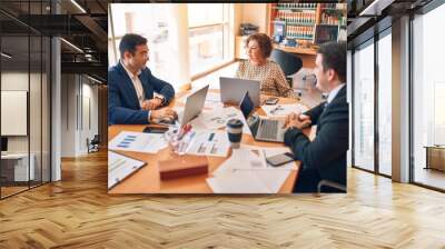 Business lawyers workers meeting at law firm office. Professional executive partners working on finance strategry at the workplace Wall mural