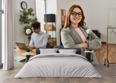 Business manager smiling happy with arms crossed gesture. Employee working at the office. Wall mural