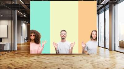 Collage of group of young people over colorful vintage isolated background relax and smiling with eyes closed doing meditation gesture with fingers. Yoga concept. Wall mural