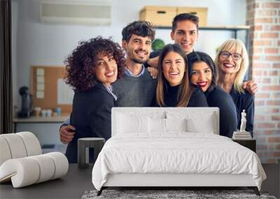 Group of business workers smiling happy and confident. Posing together with smile on face looking at the camera at the office Wall mural