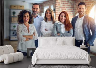 Group of business workers smiling happy and confident. Posing together with smile on face looking at the camera at the office Wall mural