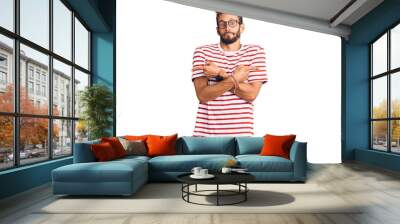 Handsome blond man with beard wearing casual clothes and glasses pointing to both sides with fingers, different direction disagree Wall mural