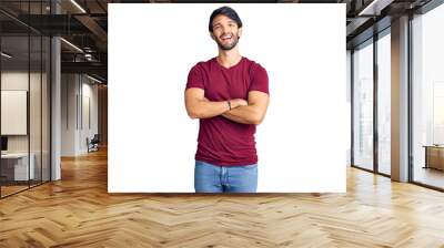 Handsome hispanic man wearing casual clothes happy face smiling with crossed arms looking at the camera. positive person. Wall mural