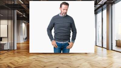 Handsome middle age senior man wearing a sweater over isolated background skeptic and nervous, frowning upset because of problem. Negative person. Wall mural