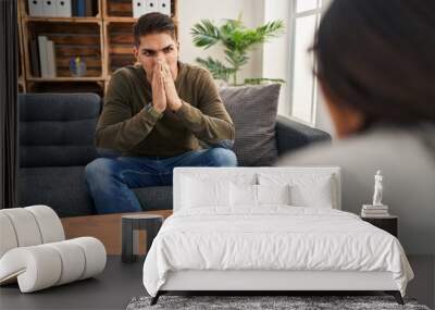 Man and woman having psychology session at clinic Wall mural